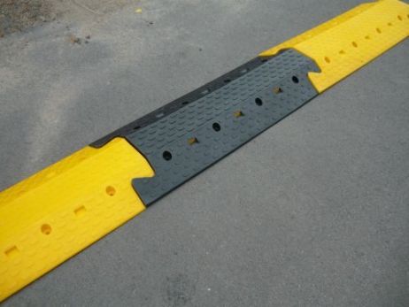 black cable / fire hose protector