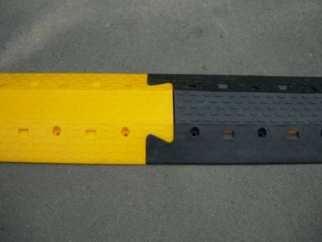 yellow cable / fire hose protector