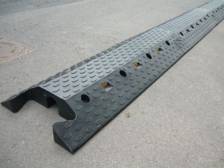 yellow cable / fire hose protector